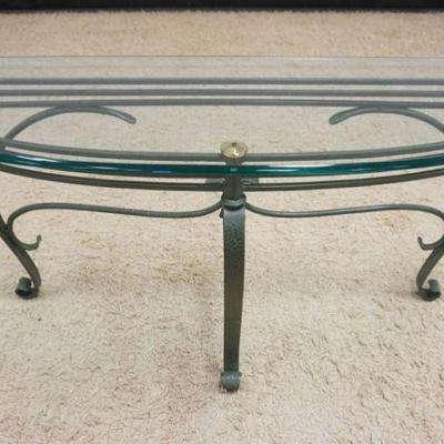 1180	DEMILUNE HALL TABLE , ORNATE IRON WITH GREEN COPPER FINISH AND BRASS ACCENTS. APPROXIMATELY 54 IN X 16 IN X 28 IN
