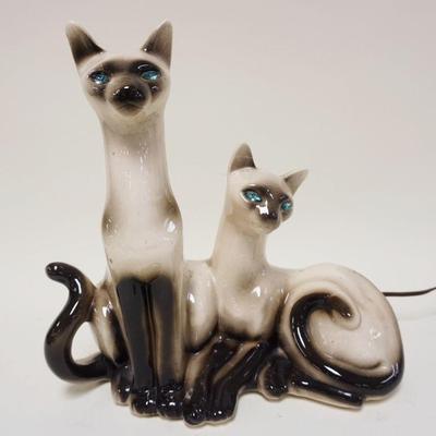 1081	SIAMESE CAT CERAMIC LIGHT W/BLUE JEWELRY LIKE EYES, APPROXIMATELY 12 1/4 IN HIGH
