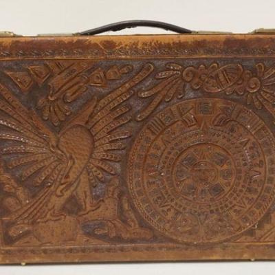 1130	TOOLED LEATHER BREIF CASE, APPROXIMATELY 3 IN X 12 IN X 17 IN, NO KEY
