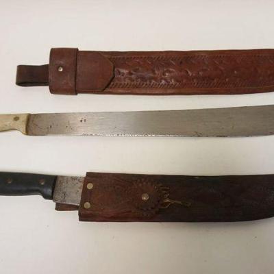 1248	LOT OF 2 MACHETES, LARGEST APPROXIMATELY 26 IN
