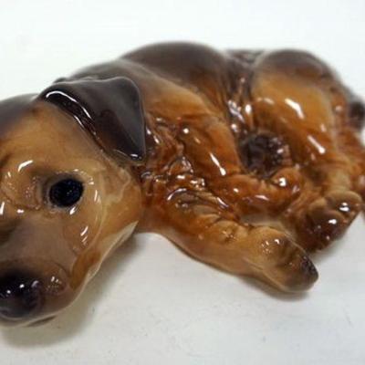 1153	GOEBEL LAYING DOWN DOG FIGURINE APPROXIMATELY 10 IN X 3 IN H
