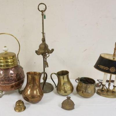 1128	LOT OF ASSORTED COPPER & BRASS ITEMS, INCLUDING TANKARDS, BETTY LAMP AND COVERED FOOTED URN

