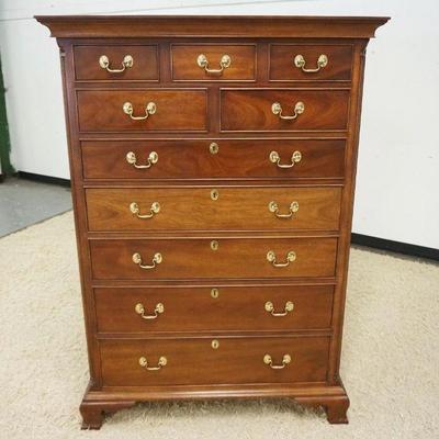 1192	STICKLEY MAHOGANY 10 DRAWER TALL CHEST ON BRACKET FEET AND REEDED COLUMN SIDES, SOME SUN FADING TO CHEST SIDES, APPROXIMATELY 43 IN...