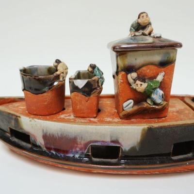 1004	 SUMIDA GAWA POTTERY VESSEL HAVING CONTAINERS W/FIGURES OF MEN SITTING ON TOP, CHIP ON SIDE OF ONE CONTAINER, APPROXIMATELY 5 IN X...