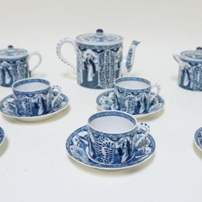 1007	ASIAN CHINA TEASET INCLUDING APPROXIMATELY 5 1/2 IN HIGH TEAPOT, COVERED CREAMER & SUGAR & 7 CUPS & SAUCERS
