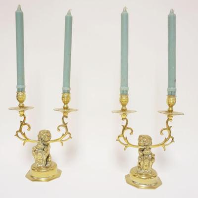 1001	PAIR OF ANTIQUE BRASS DOUBLE CANDLESTICKS W/RAMPANT LIONS HOLDING SHIELDS AT BASE, APPROXIMATELY 11 IN HIGH
