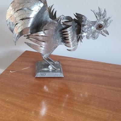 Stamped steel rooster sculpture with glass eyes