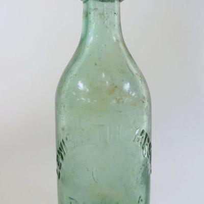 1022	ANTIQUE BEER BOTTLE LEVIS & THOMPSON, PHILADEPHIA, APPROXIMATELY 7 1/4 IN HIGH

