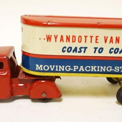 1141	TIN WYANDOTTE TOY VAN LINES TRUCK, APPROXIMATELY 8 IN X 2 IN X 4 IN HIGH
