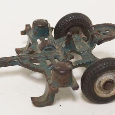 1193	ANTIQUE CAST IRON ARCADE TOY TRACTOR DISC
