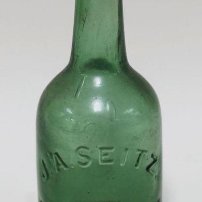 1044	ANTIQUE BEER BOTTLE JA SEITZ, EASTON PA, APPROXIMATELY 7 IN HIGH
