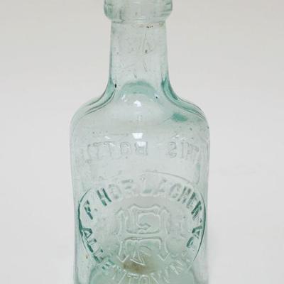 1023	ANTIQUE BEER BOTTLE F HORLACHER, ALLENTOWN PA, APPROXIMATELY 6 3/4 IN HIGH
