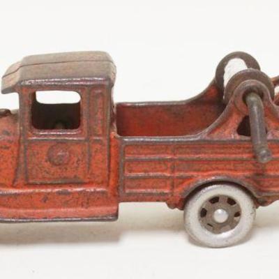 1181	ANTIQUE CAST IRON TOW TRUCK, APPROXIMATELY 9 IN LONG X 3 3/4 IN HIGH

