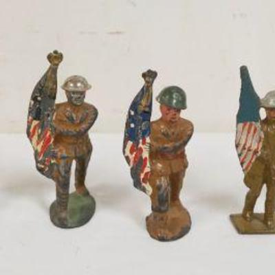 1160	LOT OF 7 ANTIQUE CAST METAL WWI SOLDER FLAG BEARERS, APPROXIMATELY 3 3/4 IN  HIGH
