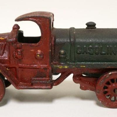 1115	ANTIQUE CAST IRON TOY GASOLINE TRUCK, APPROXIMATELY 2 1/2 IN X 7 IN X 3 1/2 IN HIGH
