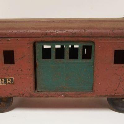 1106	ANTIQUE TOY LARGE PRESSED STEEL N.Y.C. RAILROAD TRAIN CAR W/SLIDING DOORS, APPROXIMATELY 6 IN X 18 IN X 8 1/2 IN HIGH
