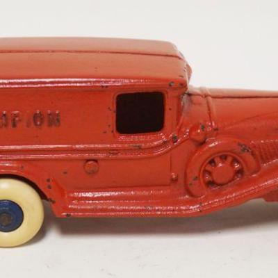 1192	ANTIQUE CAST IRON TOY VAN MARKED CHAMPION, APPROXIMATELY 8 IN LONG X 3 IN HIGH
