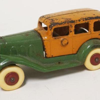 1165	ANTIQUE CAST IRON TOY CAR, APPROXIMATELY 5 IN X 2 IN HIGH
