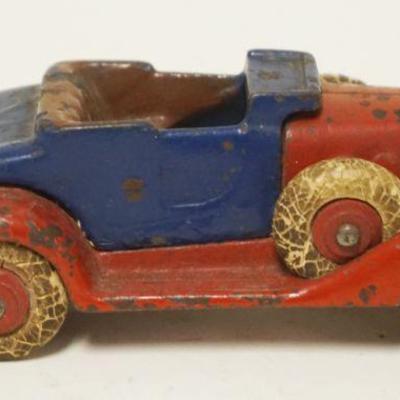 1186	ANTIQUE CAST IRON TOY CAR, APPROXIMATELY 5 IN LONG X 2 IN
