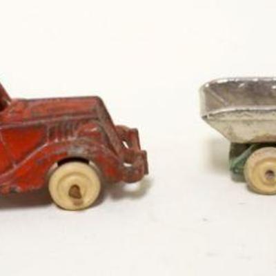 1120	ANTIQUE CAR IRON HUBLEY TOY DUMP & TOW TRUCKS, EACH APPROXIMATELY 3 1/2 IN X 1 1/2 IN HIGH
