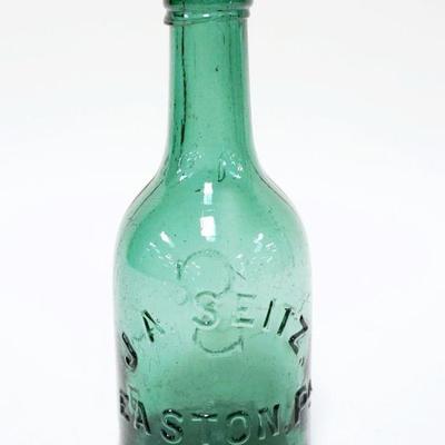 1017	ANTIQUE BEER BOTTLE J.A. SEITZ EASTON PA, APPROXIMATELY 7 1/4 IN HIGH
