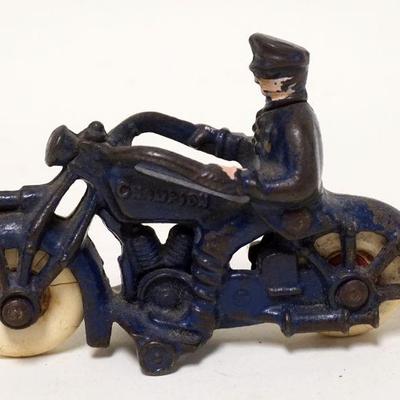 1132	ANTIQUE CAST IRON TOY MOTORCYLE MARKED CHAMPION, APPROXIMATELY 5 IN X 3 1/2 IN HIGH
