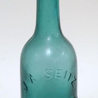 1035	ANTIQUE BEER BOTTLE J.A. SEITZ, EASTON PA, APPROXIMATELY 7 1/4 IN HIGH
