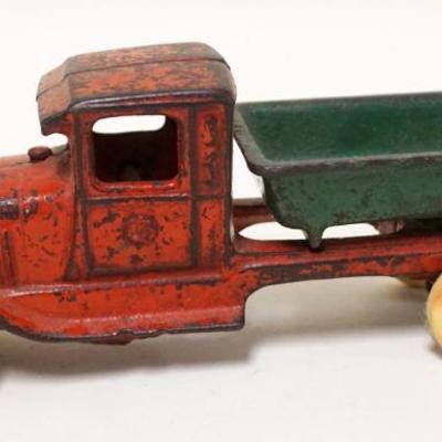 1123	ANTIQUE CAST IRON TOY DUMP TRUCK, APPROXIMATELY 2 1/2 IN X 8 IN X 3 IN
