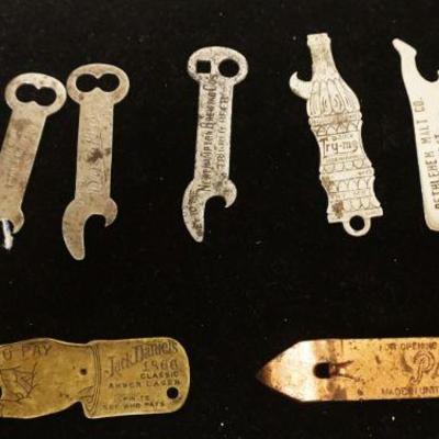1100	ANTIQUE BOTTLE BEER & SODA ADVERTISING BOTTLE OPENERS ICLUDING JACK DANIELS 1866 CLASSIC AMBER LAGER, SPIN TO SEE WHO PAYS NOVELTY...