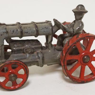 1168	ANTIQUE CAST IRON TOY TRACTOR, APPROXIMATELY 4 IN X 3 IN HIGH
