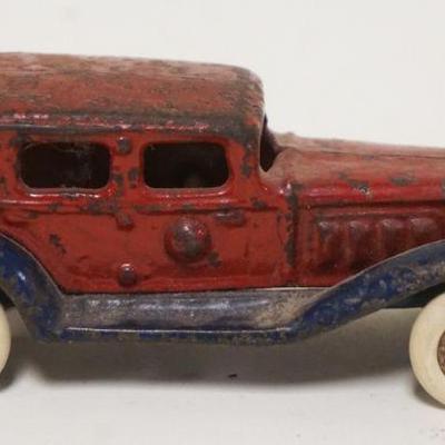 1185	ANTIQUE CAST IRON TOY CAR, APPROXIMATELY 4 1/2 IN X 1 3/4 IN
