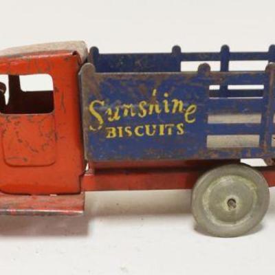 1200	ANTIQUE PRESSED STEEL SUNSHINE BISQUIT TRUCK, APPROXIMATELY 12 IN LONG X 4 IN HIGH
