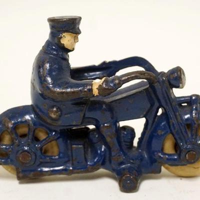 1133	ANTIQUE CAST IRON TOY MOTORCYLE, APPROXIMATELY 5 IN X 3 1/2 IN
