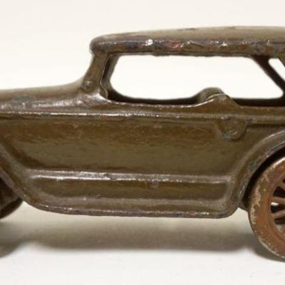 1118	ANTIQUE TOY CAST IRON CAR, APPROXIMATELY 7 IN X 2 1/2 IN X 3 IN HIGH
