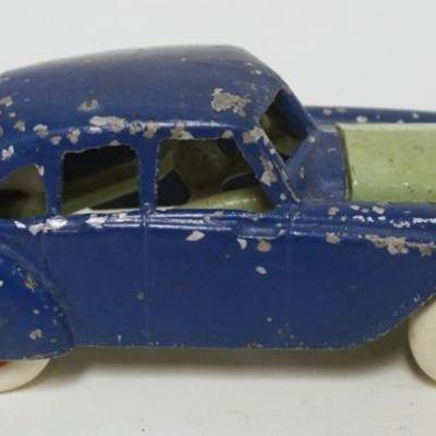 1136	ANTIQUE CAST METAL TOY CAR, APROXIMATELY 7 IN X 2 1/4 IN X 2 1/4 IN HIGH
