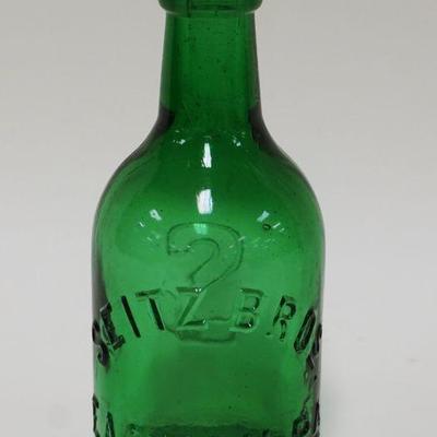 1041	ANTIQUE BOTTLE SEITZ BROS, APPROXIMATELY 6 3/4 IN HIGH
