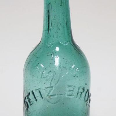 1043	ANTIQUE BEER BOTTLE SEITZ BROS, EASTON PA, APPROXIMATELY 7 1/4 IN HIGH
