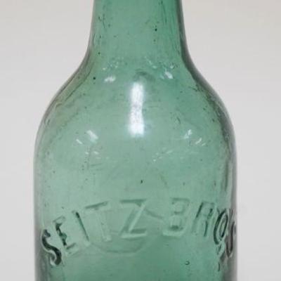 1028	ANTIQUE BEER BOTTLE SEITZ BROS, EASTON PA, APPROXIMATELY 7 1/4 IN HIGH
