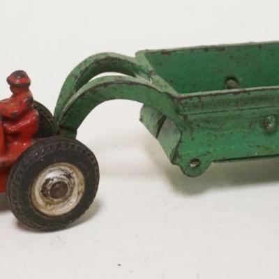 1178	ANTIQUE CAST IRON TOY TRACTOR W/CART, APPROXIMATELY 8 IN LONG X 2 IN HIGH
