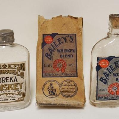 1105	ANTIQUE WHISKEY BOTTLES

