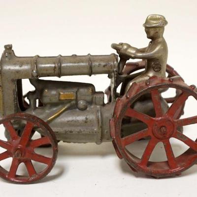 1126	ANTIQUE CAST IRON TOY TRACTOR, APPROXIMATELY 6 IN X 3 1/4 IN X 4 1/4 IN HIGH
