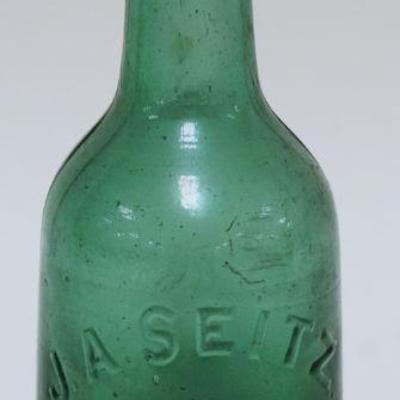 1079	ANTIQUE BEER BOTTLE JA SEITZ, EASTON PA, APPROXIMATELY 7 1/4 IN HIGH
