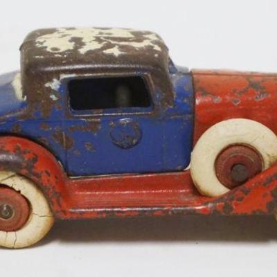 1171	ANTIQUE CAST IRON TOY CAR, APPROXIMATELY 5 IN X 1 3/4 IN HIGH
