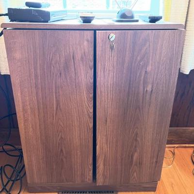 Liquor/media cabinet with keys $75
