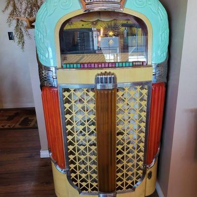 1948 rockola majic glow working jutebox with records 