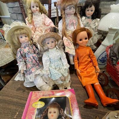 Antique collectible dolls. The two with the wooden rocking chair are $15 each, other ones range from $5-$10 depending on size. 