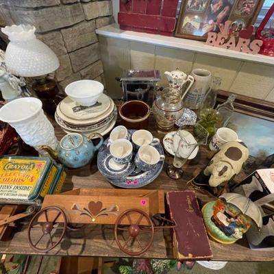 Variety of antique dishes, vases, toys, etc. 