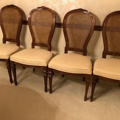 set of four dining chairs