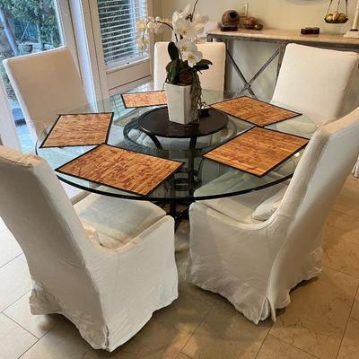 5' Dining Decorative Table w/Iron Deco Base w/Glass Top & 5 Linen Slip Covered Side Chairs - Asking: Was $1575 -- Now $1150