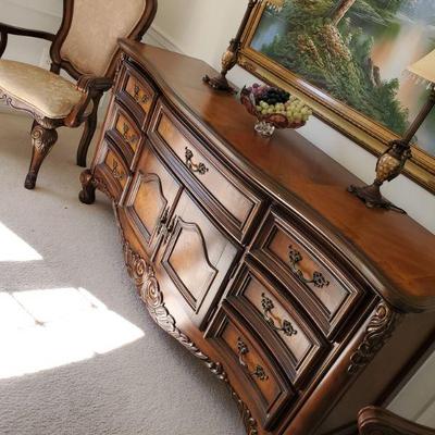 walnut stained French Provincial style buffet, dr table, 6 chairs